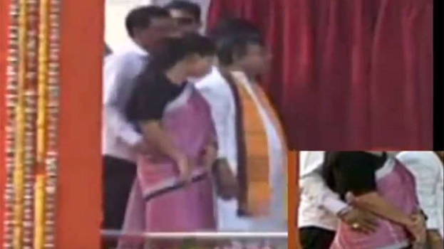 India,on stage wit pm MODI thripura minister groped colleague,thripura mini...