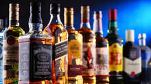 cops-line-up-liquor-bottles-for-disposal-locals-grab-and-run-off