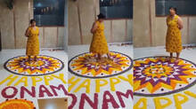 lady-destroyed-onam-pookalam