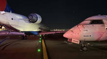 two-delta-planes-collide-while-taxiing