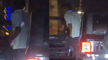 man-caught-urinating-from-moving-car--two-arrested