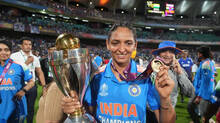indian-captain-harmanpreet-kaur-shares-picture-of-sleeping-with-world-cup-trophy
