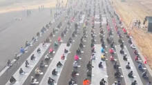 thousands-of-aspirants-sit-on-airstrip-for-writing-government-exam