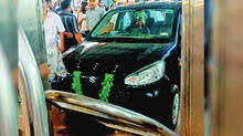car-in-guruvayur-for-pooja-goes-out-of-control-gate-collapses
