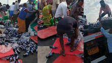 lorry-accident-locals-loot-soft-drink-bottles-viral-video