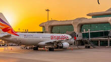 air-arabia-passenger-opens-emergency-exit-door-jumps-off-taxiing-flight-at-chennai-airport