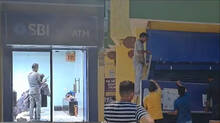 hair-cutting-inside-sbi-atm-gone-viral