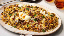 dead-insect-in-food-consumer-court-orders-to-provide-10-plates-of-biryani-free-to-complainant