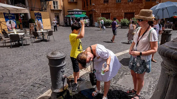 pouring-water-over-head