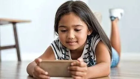 kid-using-phone.1785349634