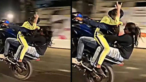 rider-stunts-two-girls