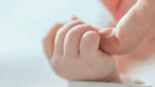 couple-throws-newborn-bab