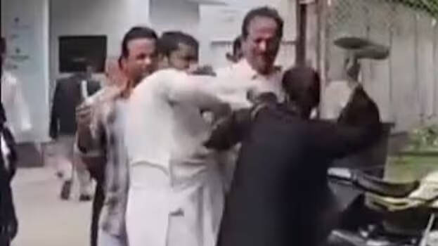 woman-beats-husband-with- woman-beats-husband-with-